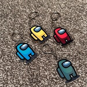 Among Us Game Pack of 4 Acrylic Keychains Cyan Magenta Yellow and Green